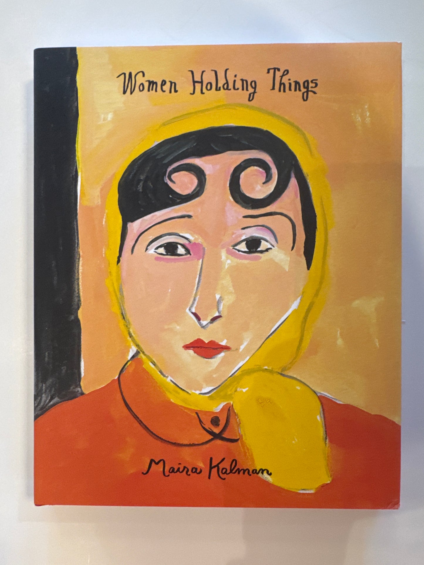Women Holding Things Book