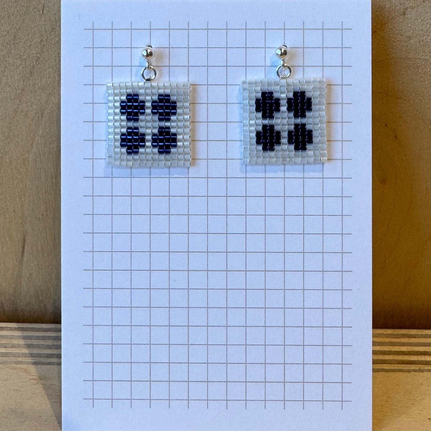Navy Blue Crosses on White
