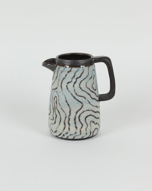 Carved Pitcher