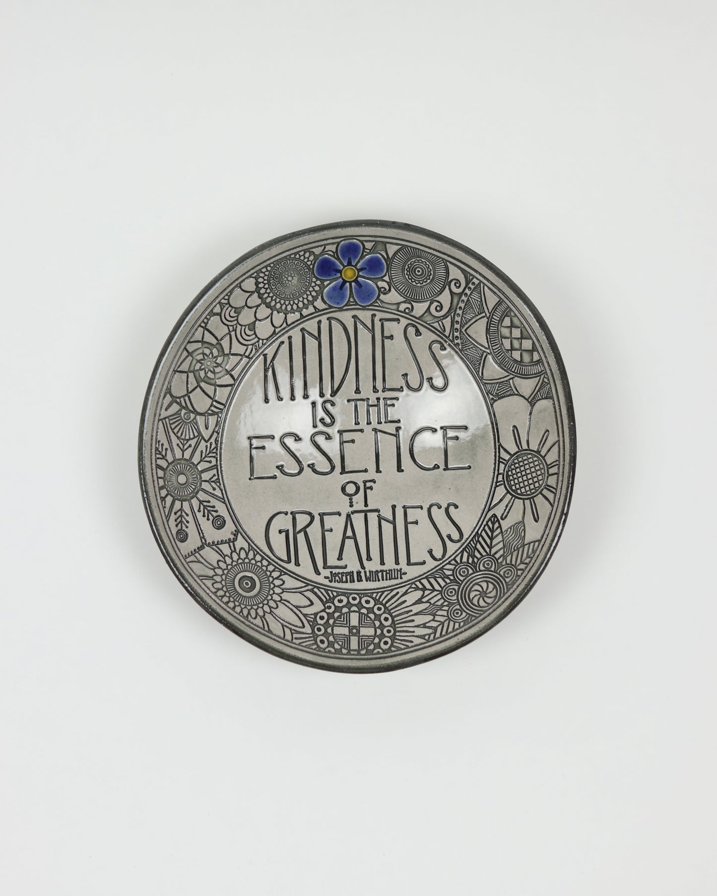 Kindness Is The Essence of Greatness Carved Bowl
